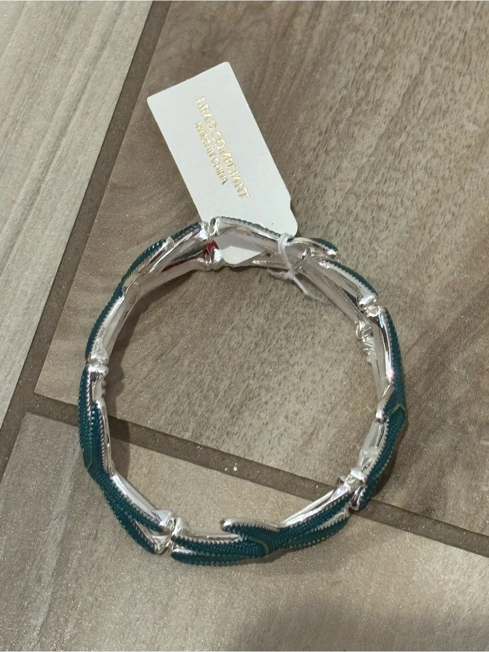 Natasha Couture silver tone